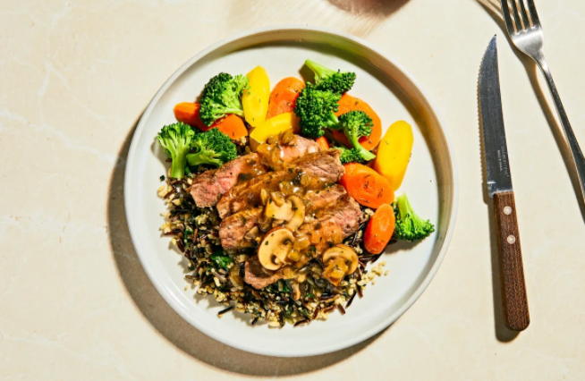 TRUFFLED MUSHROOM STEAK with Spinach & Wild Grain Sauté